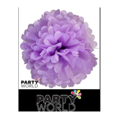 Red 40cm tissue puff ball hanging as a bold decoration above a party table