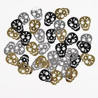 Day of the Dead skull face scatter confetti in silver, gold and black