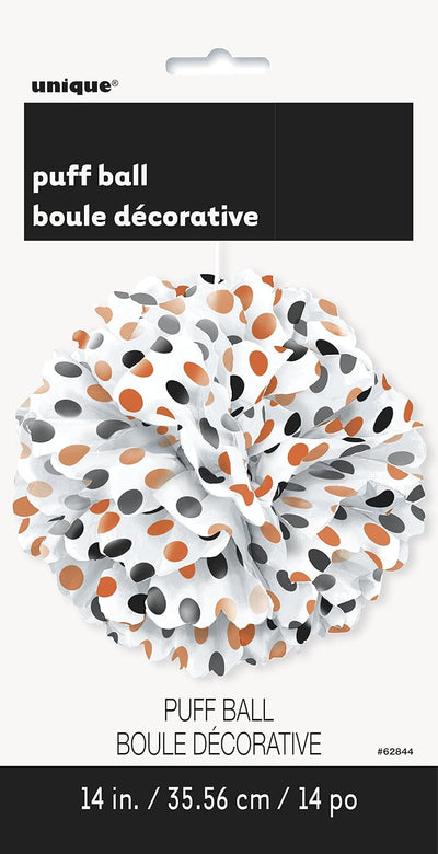 White puff ball with orange and black polka dots hanging as a Halloween decoration