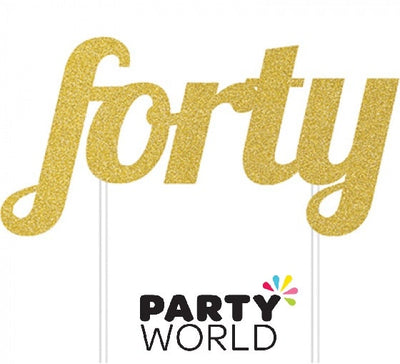 Gold glittered number 50 cake topper, a stand-in decoration for a fiftieth birthday cake