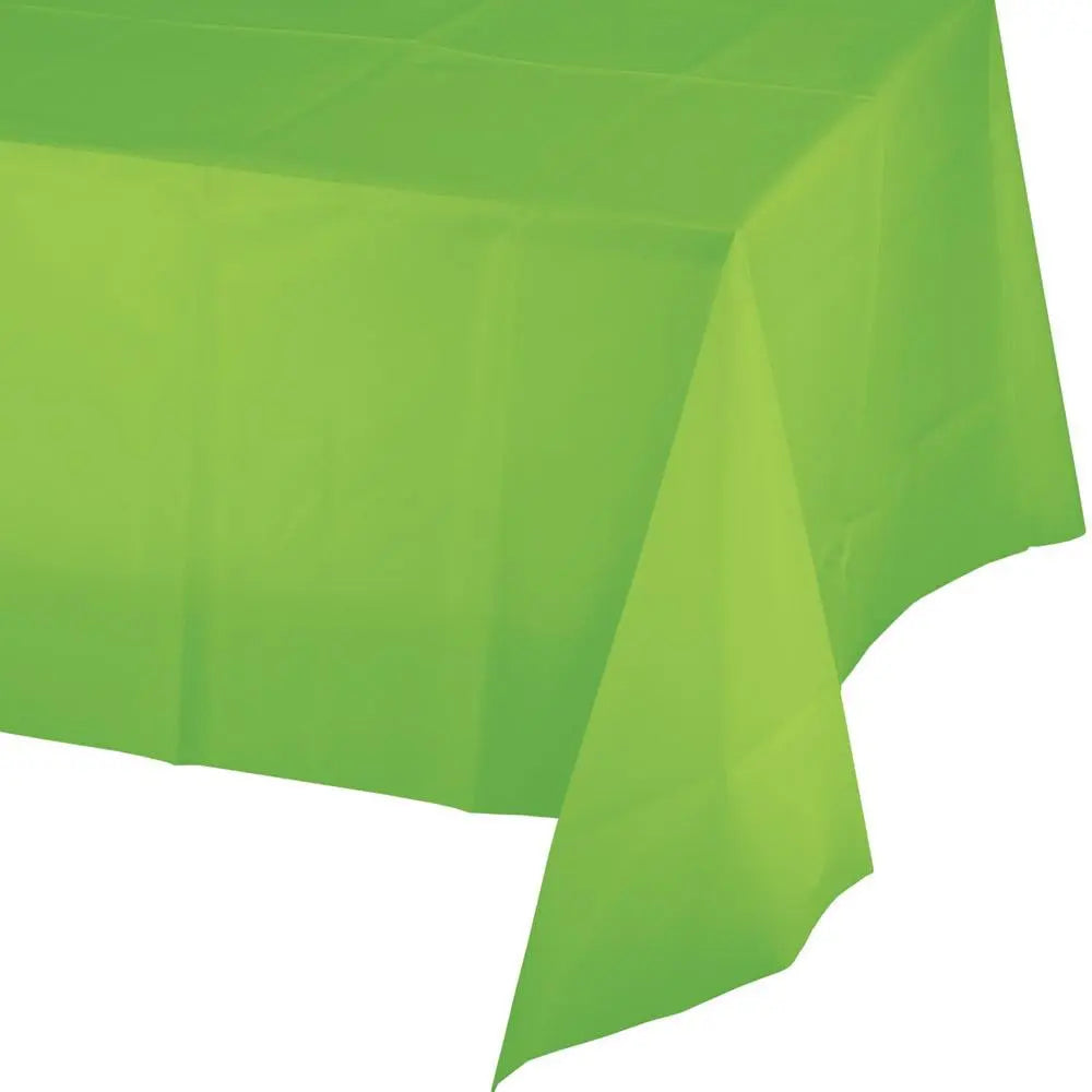 Lime green plastic rectangle table cover 137 by 274cm set for a St Patrick's party