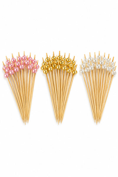 Twelve pearl topped food picks in pink, white or gold for grazing boards