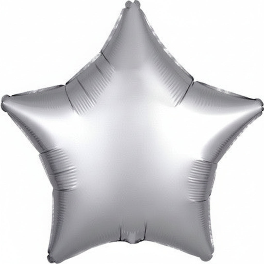 Luxe platinum star foil balloon 45cm floating above a milestone birthday table