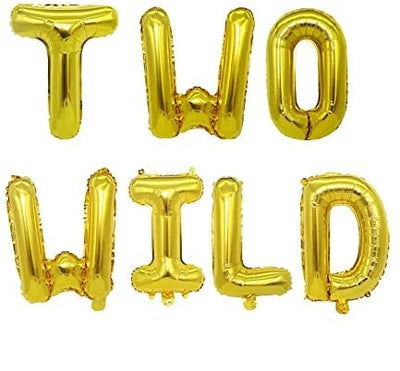 Two Wild gold balloon banner spelling the words for a second birthday cake table